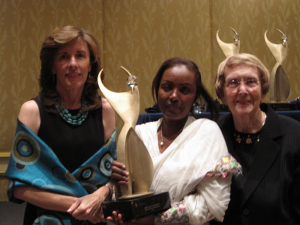 Dr. Mulu Muleta (Middle) receiving her award with Kate Grant, Executive Director The Fistula Foundation and Dr. Carole Leland, a Board Member of Athena International.